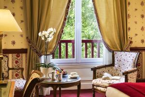 Hotels Le Castel Marie Louise : photos des chambres