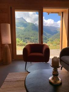 Chalets Superbe chalet avec vue montagne : photos des chambres