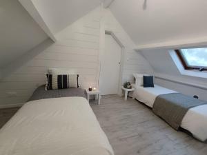 Maisons de vacances Maison Saint-Brevin-les-Pins, 5 pieces, 8 personnes - FR-1-364-152 : photos des chambres