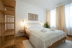 Bright and cozy studio with a city view