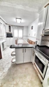 H130 Villa adosada con jardín y txoko by Egona