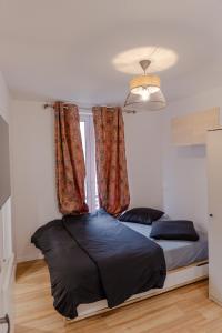 Appartements Meubles de Tourisme a Vincennes : photos des chambres