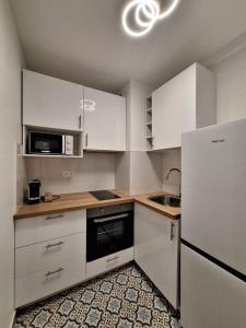 Appartements Le Traditionnel - En bordure de Paris - 322B : photos des chambres