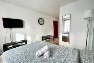 Appartements Studio Wifi Metro Paris (Residence Peri) : photos des chambres