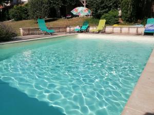 Maisons de vacances Ancienne forge restauree et piscine : photos des chambres