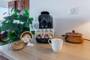 Appartements The Sunrise ~ Spacious, fully equipped & parking : photos des chambres