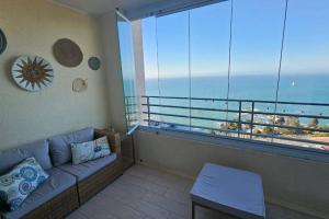 Frente a la playa. Vista al mar.