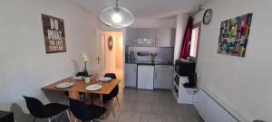 Appartements Cosy Rez jardin 1 chambre plage parking wifi : photos des chambres