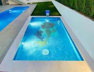 Villa am Meer mit Pool & Kinderpool - Leon's Holiday Homes 