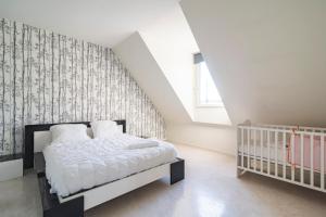 Appartements Santa Monica, maison spacieuse Reims Cormontreuil : photos des chambres