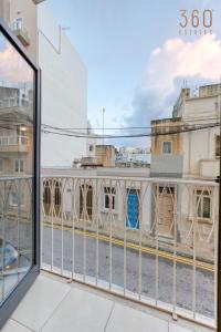 Modern 1BR home with Private Balcony in St Julians by 360 Estates