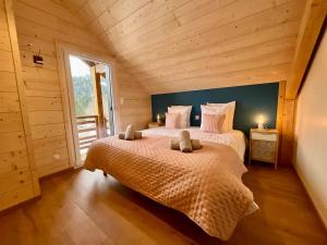Maisons de vacances CHALET LES 2 MARMOTTES 4 etoiles Bain nordique, Petanque : photos des chambres