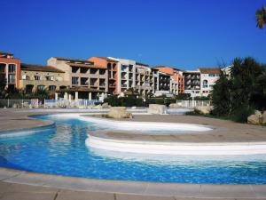 GASMIC - Appartement pour 4 personnes avec piscine et accès direct à la plage situé aux marines de Gassin