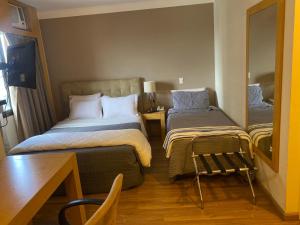 Quarto triplo em Congonhas