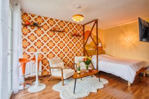 Suite année 70 - Jacuzzi et Balcon