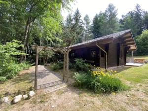 Chalets LE FISHING LODGE Chalet en bois avec bain nordique : photos des chambres