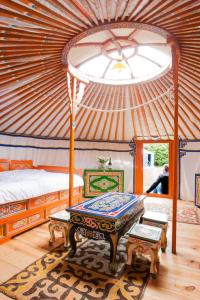 Tentes de luxe Rando-Yourte : photos des chambres