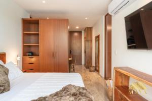 NHOA 211B Lux 1BR Condo Pool View in Aldea Zama