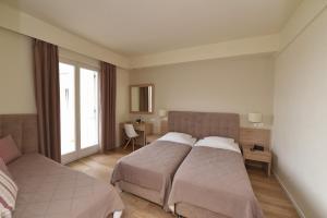 Triple Room with Sea View room in Hotel Hermes