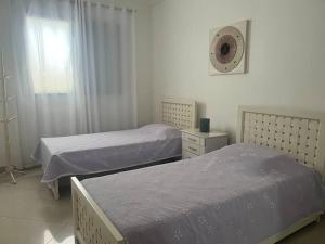 Apto a 400 m da praia da Enseada