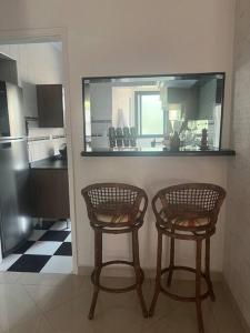 Apto a 400 m da praia da Enseada