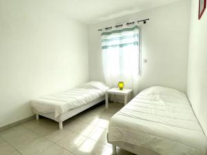 Maisons de vacances Charmante Maison a la mer proche plage : photos des chambres