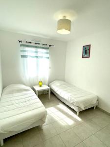 Maisons de vacances Charmante Maison a la mer proche plage : photos des chambres