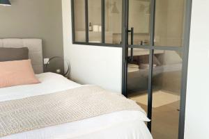 Appartements Logement avec hammam - 130 m2 + jardin : photos des chambres