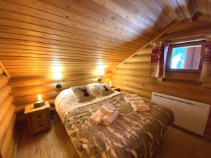 Chalets LE GRAND CERF Chalet en rondins avec SPA Jacuzzi : photos des chambres
