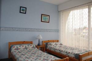 Appartements 450 - A ERQUY, en bordure de la tres belle plage de CAROUAL : photos des chambres