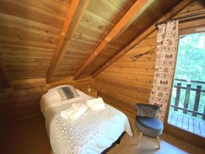 Chalets LE MONTAGNARD Chalet en bois : photos des chambres