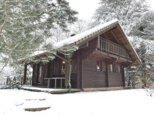 Chalets LE MONTAGNARD Chalet en bois : photos des chambres