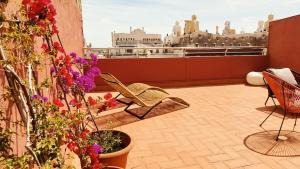 Three-Bedroom Penthouse with Terrace room in Quartprimera Apartments