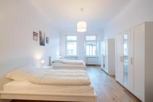 Apt Volt - Modern, neu, komplett ausgestattet, 4 Einzelbetten, zentral mit Waschmaschine Spülmaschine TV Herd Backofen Mikrowelle