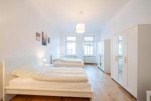 Apt Volt - Modern, neu, komplett ausgestattet, 4 Einzelbetten, zentral mit Waschmaschine Spülmaschine TV Herd Backofen Mikrowelle