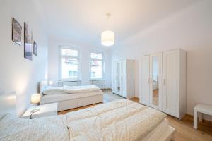 Apt Volt - Modern, neu, komplett ausgestattet, 4 Einzelbetten, zentral mit Waschmaschine Spülmaschine TV Herd Backofen Mikrowelle