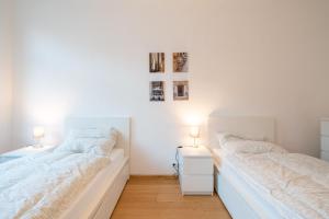 Apt Volt - Modern, neu, komplett ausgestattet, 4 Einzelbetten, zentral mit Waschmaschine Spülmaschine TV Herd Backofen Mikrowelle