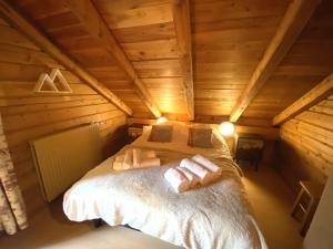 Chalets LE SKIEUR Chalet en bois : photos des chambres