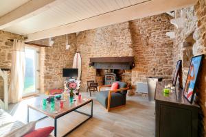 Maisons de vacances Escapade dans une belle longere a Penmarch : photos des chambres