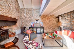 Maisons de vacances Escapade dans une belle longere a Penmarch : photos des chambres