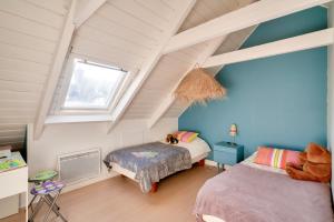 Maisons de vacances Escapade dans une belle longere a Penmarch : photos des chambres