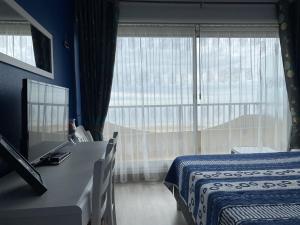 Appartements 470 - Appartement acces direct a la tres belle plage de CAROUAL 2km de sable fin : photos des chambres