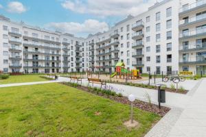 Old Town Aesthetic Deep Blue Apartments in Gdańsk by Renters