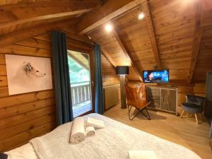 Chalets LE RENARD Chalet en bois : photos des chambres