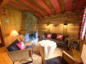 Chalets LE TRAPPEUR Chalet en bois : photos des chambres