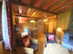Chalets LE TRAPPEUR Chalet en bois : photos des chambres