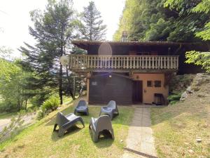 Chalets LE TRAPPEUR Chalet en bois : photos des chambres
