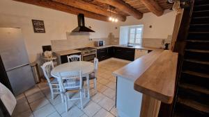 Appartements Maison de campagne : photos des chambres