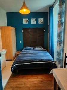 B&B / Chambres d'hotes Les Volets Bleus : photos des chambres