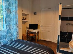 B&B / Chambres d'hotes Les Volets Bleus : photos des chambres